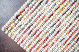 Colourful wool rug styled in a kids room