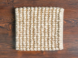 Full top-down view of camel wool rug