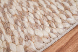 Full room view with honeycomb taupe wool rug