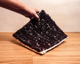 Cola brown chunky braided wool rug flat view