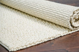 Ivory pebble rug styled in Scandinavian living room