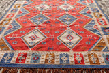 Southwestern kilim rug styled in a living room setting