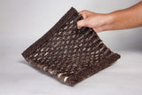 Brown ivory wool rug edge and binding detail