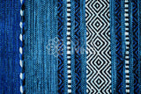 Diamond pattern detail on blue kilim rug