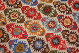Aztec kilim rug styled on a patio setting