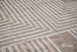 Wide shot of beige rustic rug in a bright room