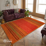 Orange kilim rug shown at an alternate angle