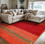 Red kilim rug in a bedroom setting