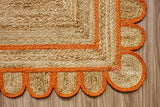 Close-up of hand-braided scallop edge detail