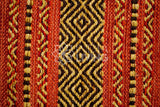 Full view of red kilim rug in natural light
