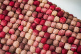 Beige red wool rug in a bedroom decor setting