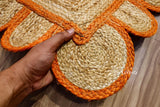 Scallop braided edge close-up in orange jute