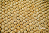 Tan beige wool rug corner detail showing reversible edge