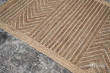 Braided jute rug texture close-up
