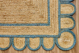 Close-up of scalloped edge and aqua border