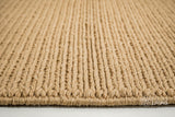 Tan beige wool rug placed under furniture