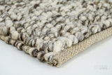 Ivory brown wool rug placed in a pet-friendly living space