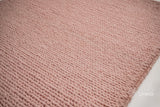 Light pink wool rug full view from above