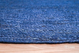Blue jute rug placed in entryway