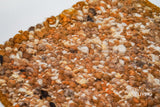 Texture close-up of handwoven rust brown wool