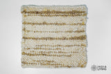 Close-up of striped wool texture in ivory beige
