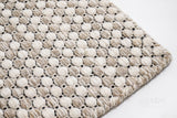 Beige cream ribbed flatweave wool rug, flat lay view