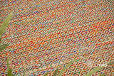 Multi blend diamond wool rug styled in a living room