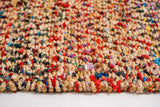 Natural jute diamond rug in a bright entryway setting