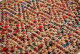Natural jute diamond rug under a coffee table