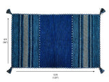 Overhead view of blue cotton chenille kilim rug