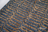 Bluish grey abstract rug pile close-up