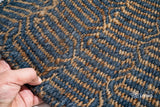 Geometric flatweave rug in a hallway entryway