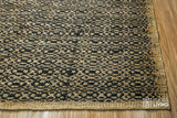 Natural jute rug corner detail showing pattern