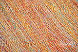 Close-up of multi blend orange weave texture