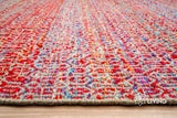 Multi blend red flatweave rug corner detail