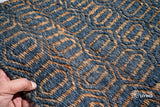 Bluish grey diamond geometric rug pile close-up