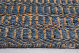 Bluish grey diamond flatweave rug styled in a living room