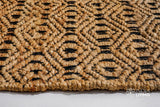 Natural jute rug corner detail showing edge binding