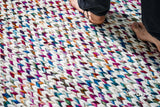 Rainbow rug styled in living room