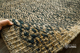 Jute rug under a coffee table lifestyle shot