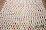 Ivory wool rug corner and edge detail