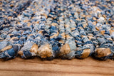 Denim chindi rug in a small entryway