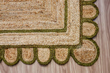 Olive green jute rug corner detail showing braided texture