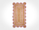 Light pink jute runner styled in a hallway setting