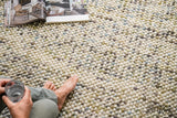Pastel loop rug styled in a living room