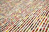 Striped chunky loop rug full room lifestyle view