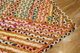 Rainbow braided rag rug styled in a boho living room