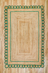 Close-up of scalloped edge on hand braided jute rug