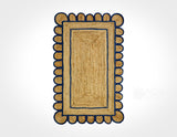 Navy blue scallop jute runner styled in a hallway