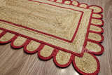 Overhead view of red jute runner on wood flooring